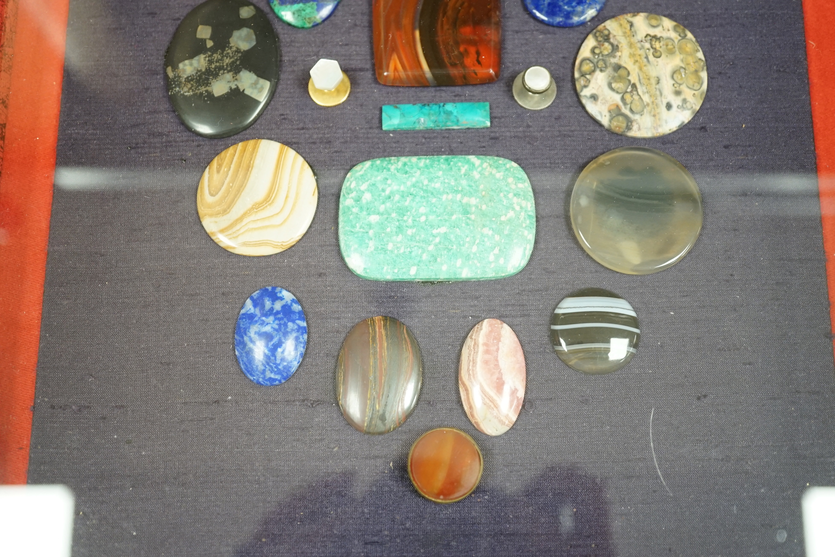 A framed case of mixed agates, 34cm x 38.5cm